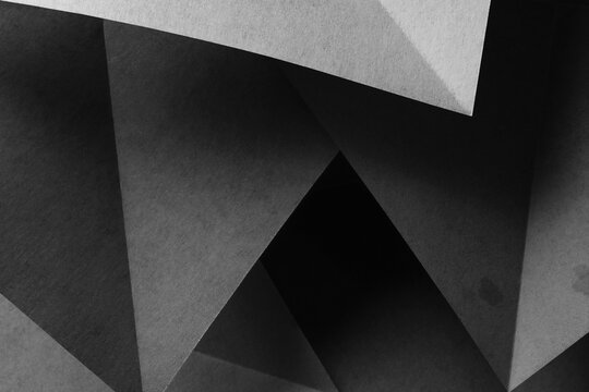 Geometric shapes made paper, dark background