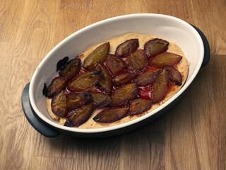 Plum cake in a baking dish