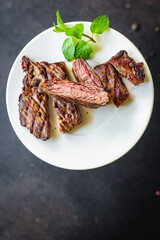 steak grill meat beef bbq veal grilled barbecue on the table, healthy meal snack copy space food background keto or paleo diet