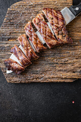 steak grill meat beef bbq veal grilled barbecue on the table, healthy meal snack copy space food background keto or paleo diet