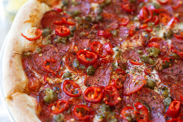 Pepperoni pizza with salami and jalapeno chili. Very spicy and delicious pizza.