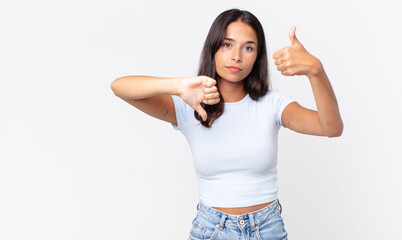 pretty thin hispanic woman feeling confused, clueless and unsure