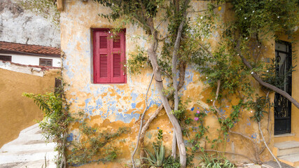 Colorful house at the traditional district of Plaka, the Old Town of Athens, Greece. The district...