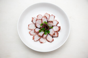 Korean food which is called mun-eo sughoe, Parboiled and Sliced Octopus