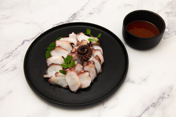 Korean food which is called mun-eo sughoe, Parboiled and Sliced Octopus