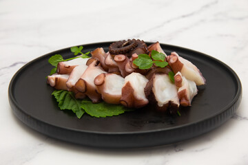 Korean food which is called mun-eo sughoe, Parboiled and Sliced Octopus
