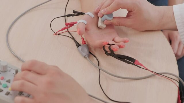 Patient nerves testing using electromyography at medical center
