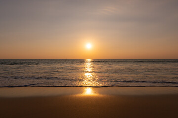 Naklejka na ściany i meble Sunset on the sea Phuket Thailand beach.