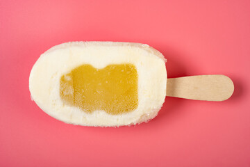 top view fresh milk flavor popsicle on a pink background