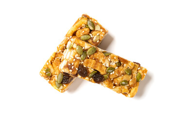 top view sweet caramel treats with raisins and melon seeds on white background