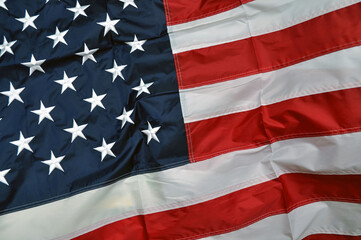 United States of America flag. Fragment of fabric in the colors of the American flag.