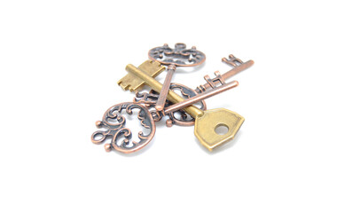 Vintage key on white background close-up. Texture, background, old, macro, wallpaper, metal, brass