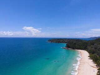 Aerial view tropical beach and sea Top down view of drone. Andaman sea Phuket Thailand.
