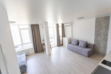 Kitchen and living room of loft apartment