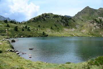 Fototapeta na wymiar Lake in Collada de Pessons. Pirynees. Grau Roig, Soldeu, Andorra