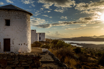 view of an old windmill at sunset in bodrum turkey