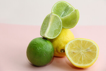 lemon, lime and juicy lime slices on a bright background