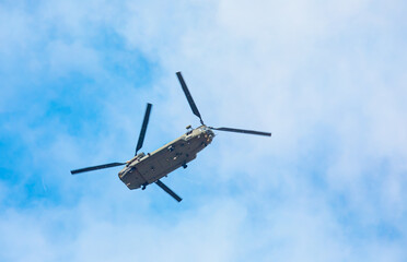 Fototapeta na wymiar Army troop transport helicopter flying 