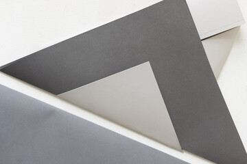 blank gray paper triangles on a light background