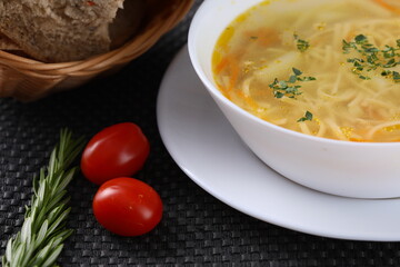 A bowl of healthy chicken noodle soup