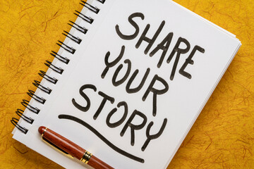 share your story - motivational handwriting in a spiral notebook, sharing experience and wisdom...
