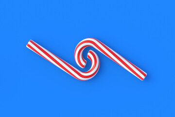 Christmas canes, candy with red stripes on blue background. New Years celebration concept. Traditional sweet dessert. Top view. 3d render