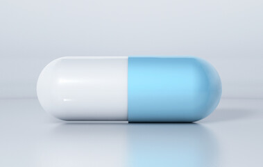 A pill or capsule of medicine in the foreground