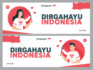 spirit of Indonesian Independence Day. 17 august 2 youths carrying flags celebrated independence day by carrying flags with enthusiasm. Use it for banners, and backgrounds.