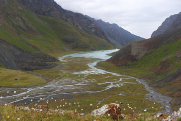 Rough rivers and blue lakes in a mountain valley. Beautiful nature in a hard-to-reach place
