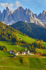 Famous best alpine place of the world, Santa Maddalena village with magical Dolomites mountains in...