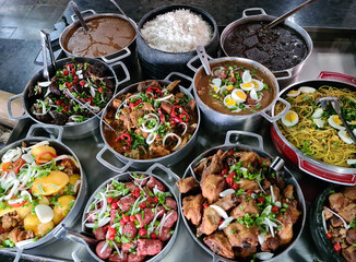 Minas Gerais cuisine made on a wood stove with rice, beans, feijoada