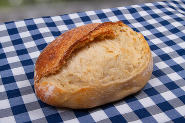 Freshly baked golden brown Scoring bread