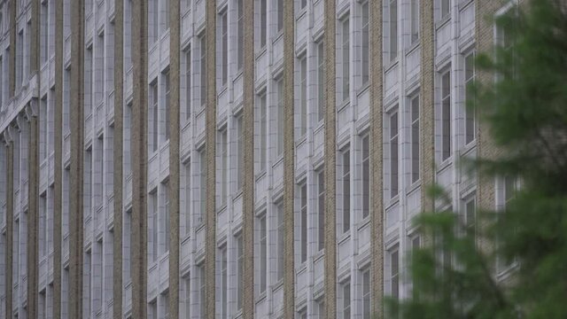 A building in downtown Tulsa, Oklahoma shot at an interesting angle.  Rows and rows of windows run diagonal across the frame.