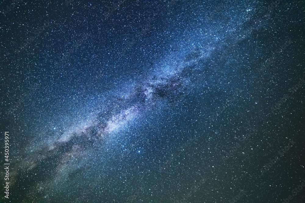 Wall mural beautiful bright milky way galaxy on the dark sttary sky. space, astronomical background.