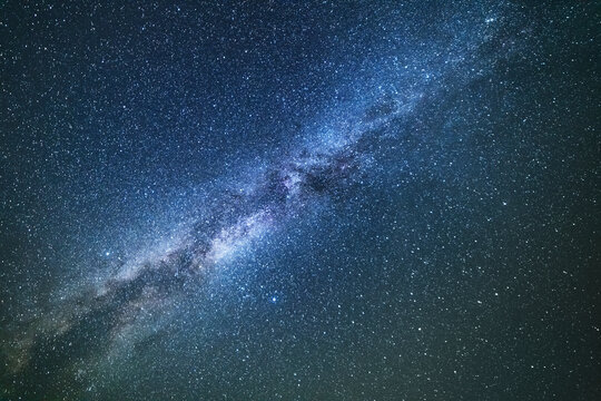 Beautiful bright milky way galaxy on the dark sttary sky. Space, astronomical background. 