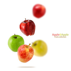 Colorful different varieties of  fresh red, green and yellow apples with water drops flying