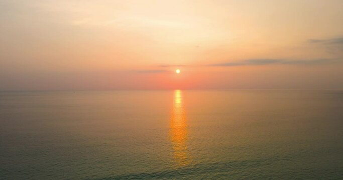 Summer sea Sunset in tropical beach sea. New normal after covid-19. Phuket Thailand beautiful tropical beach with sunset sky. Beautiful Phuket beach is famous tourist destination at Andaman sea summer