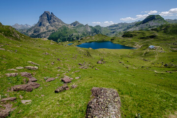 Fototapeta na wymiar trekker on Tour de l Ossau and Ayous lakes tour, Pyrenees National Park, Pyrenees Atlantiques, France