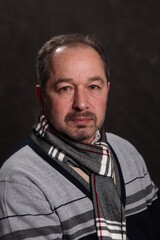 portrait of a man, various poses, looking at the camera, black background, pavilion, half-length portrait