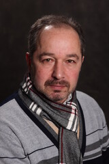 portrait of a man, various poses, looking at the camera, black background, pavilion, half-length portrait