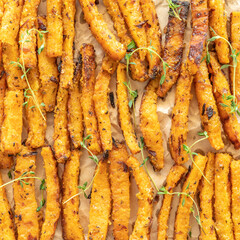 Baked pumpkin fries with fresh thyme.