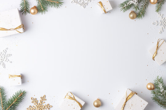 Christmas decorations with gifts on white background. Flat lay, copy space