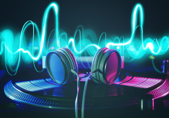 Headphones on modern DJ mixer, closeup