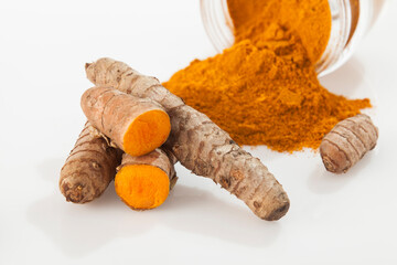 Fresh organic root and turmeric powder - Curcuma longa; Healthy Food.
