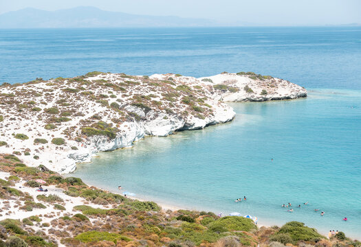 One of the beautiful bays of Foca (Phokaia) town in Izmir, Turkey. Fo&ccedil;a is a coastal resort town located in izmir. View of sunny summer day on coastline and blue mediterranean sea.
