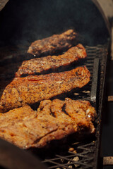 Slabs of pork ribs on grill