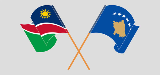 Crossed and waving flags of Namibia and Kosovo