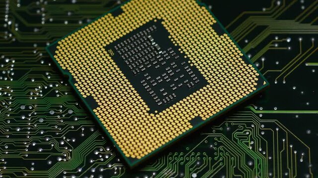 Detail of CPU Computer Processor on green electronic printed circuit board