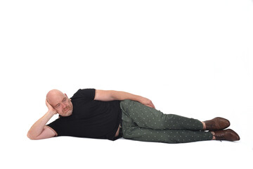 lyng man on a floor and pensive on white background