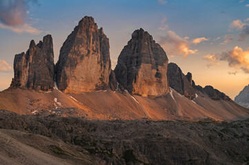 Three peaks of Tre Cime di Lavaredo during sunset